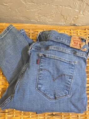 Levi's Blue Denim 311 Skinny Shaping Jeans with Tan Leather Patch and Red Print